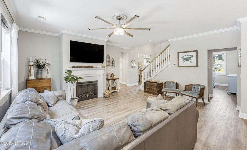 Beautifully set on a private, wooded lot in the sought-after - photo 8