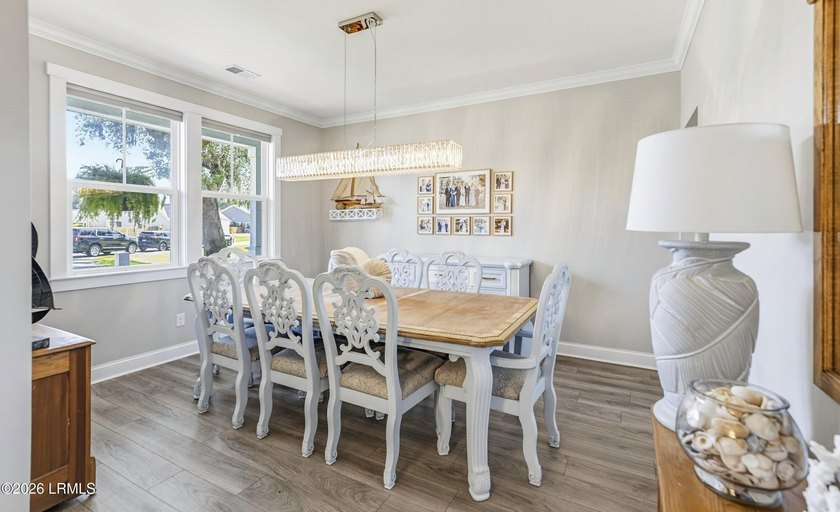 Beautifully set on a private, wooded lot in the sought-after - photo 9