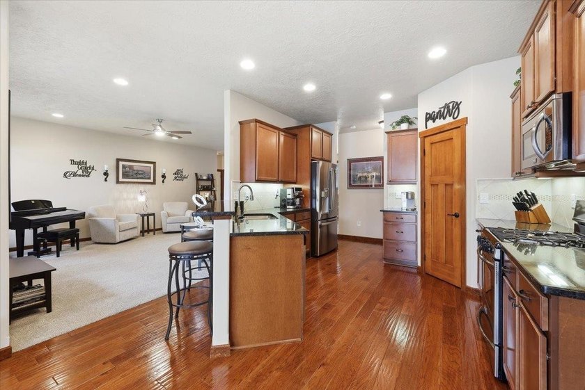 Impeccably maintained one-level home in the gated community of - photo 14