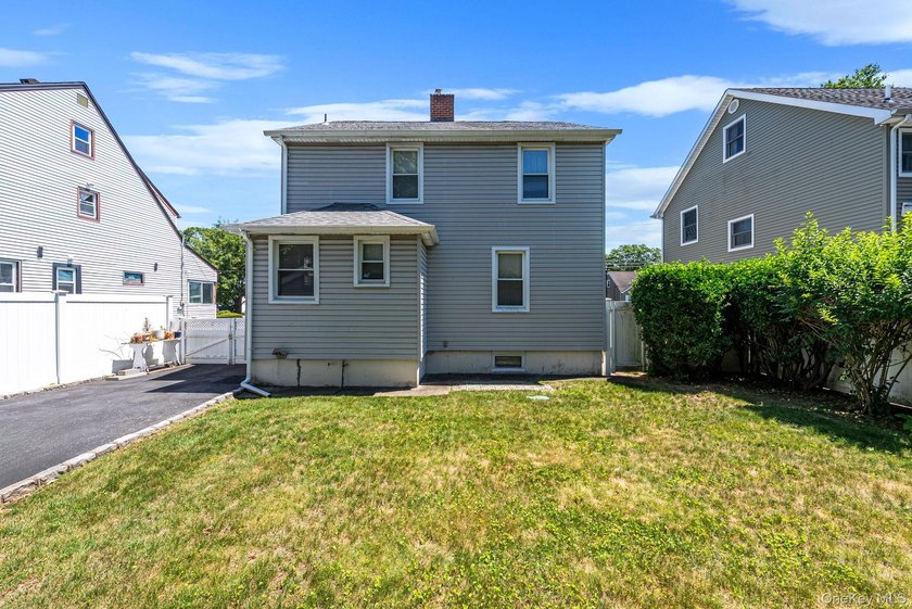 Welcome Home To This Charming Merrick Cape Cod Nestled Mid Block - photo 19