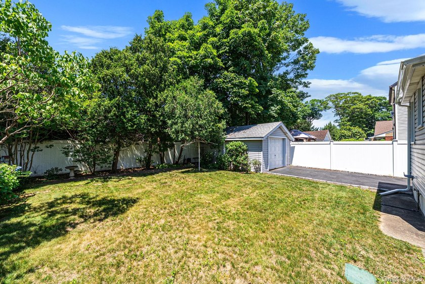 Welcome Home To This Charming Merrick Cape Cod Nestled Mid Block - photo 21