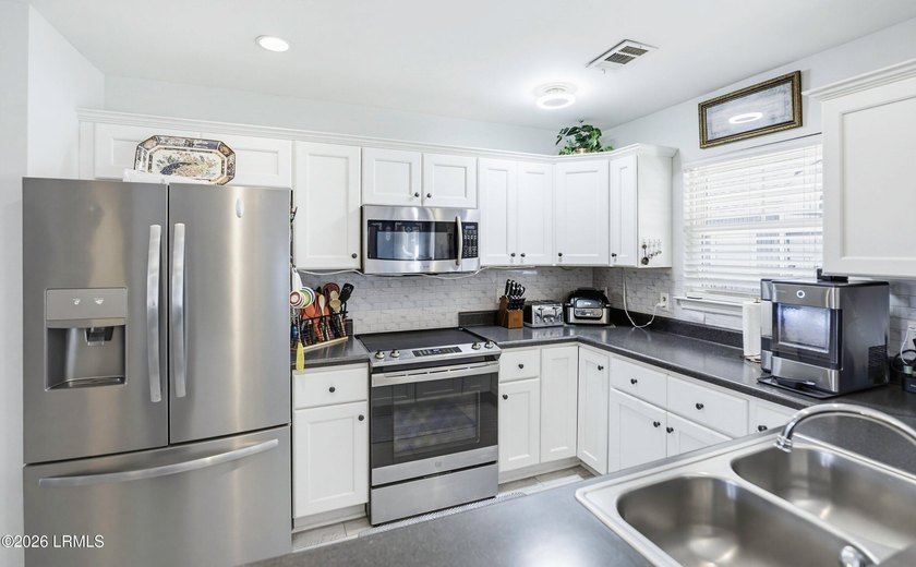 MAJOR PRICE REDUCTION! This home has been remodeled and updated - photo 9