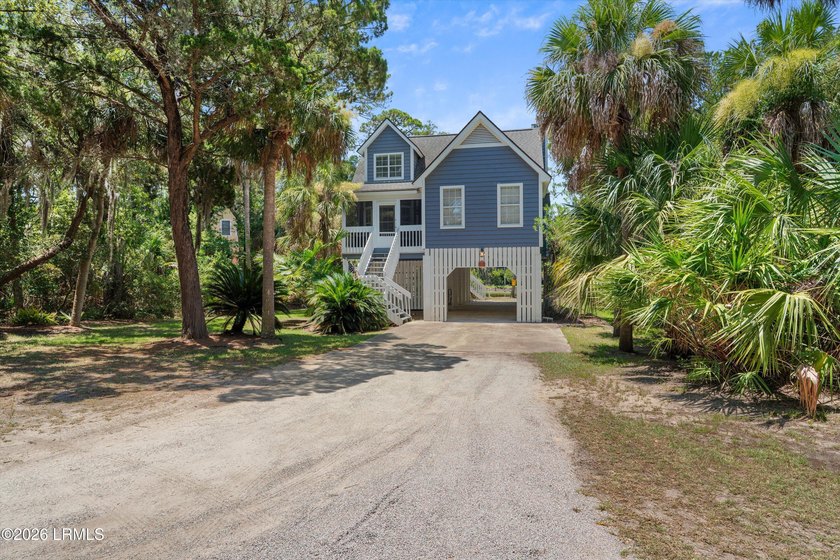 Tucked away within the gated community of Harbor Island, this - photo 2