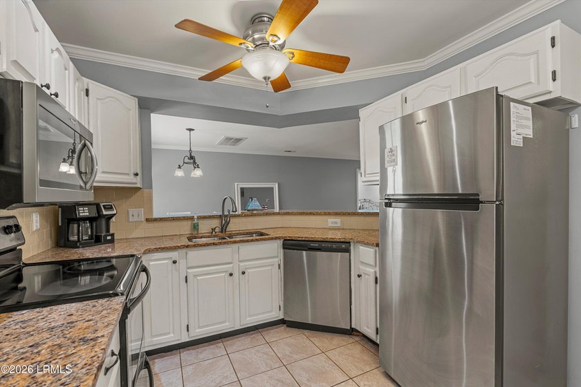 Tucked away within the gated community of Harbor Island, this - photo 10