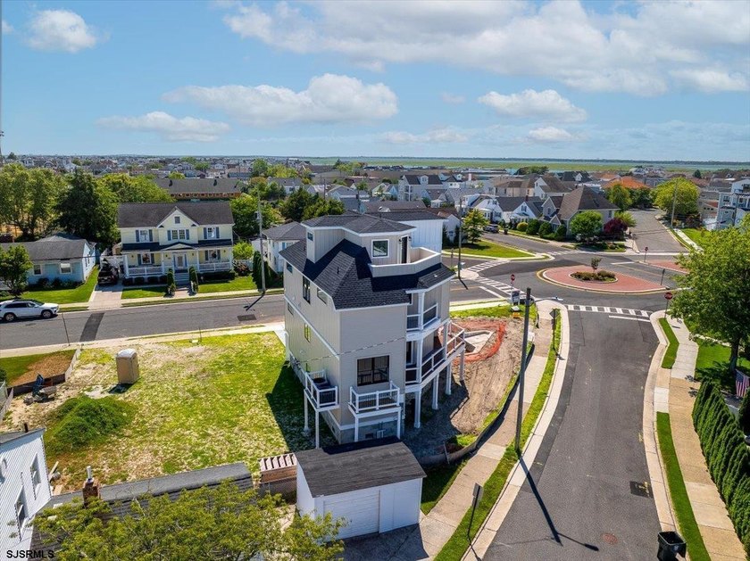 Experience exceptional coastal living in this stunning new - photo 15