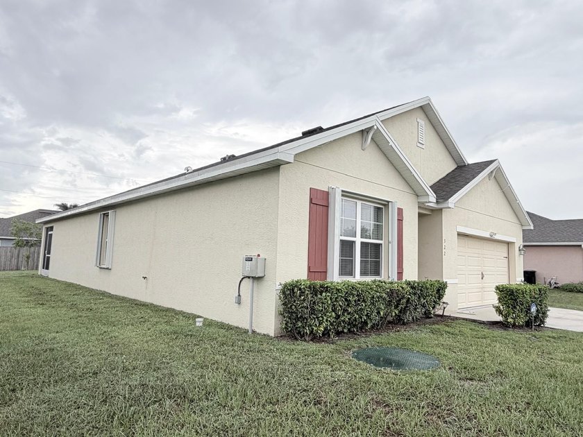 Welcome to this very well kept four-bedroom, two-bathroom - photo 34