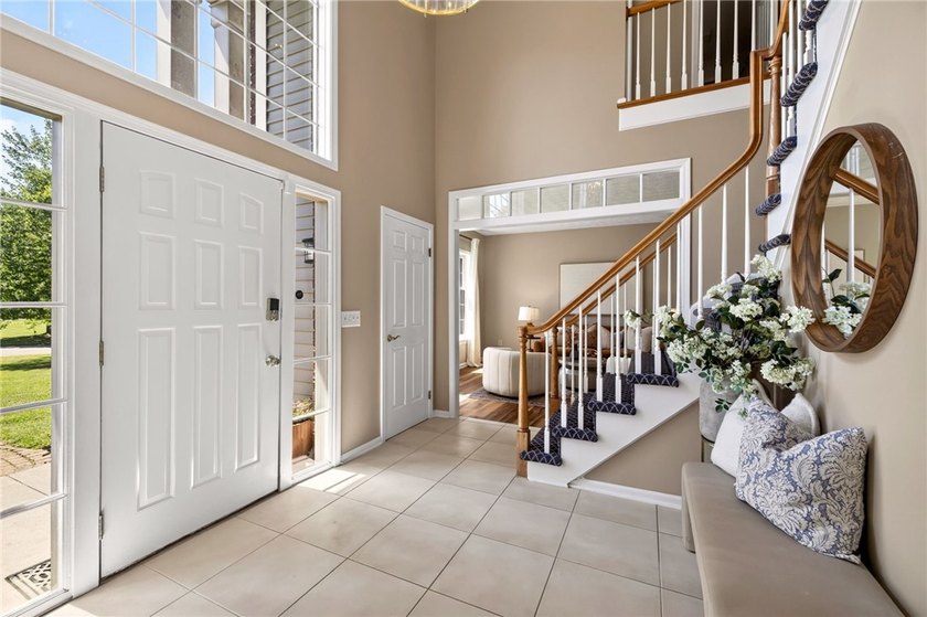 Set on nearly half an acre in a sought-after Penfield - photo 3