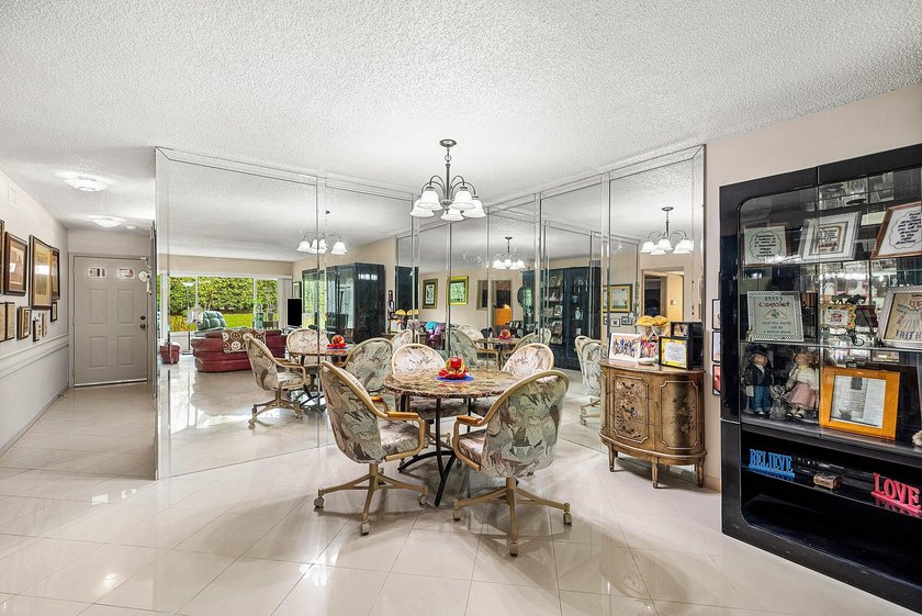Tucked away as a private end-unit in desirable Town Villas, this - photo 11