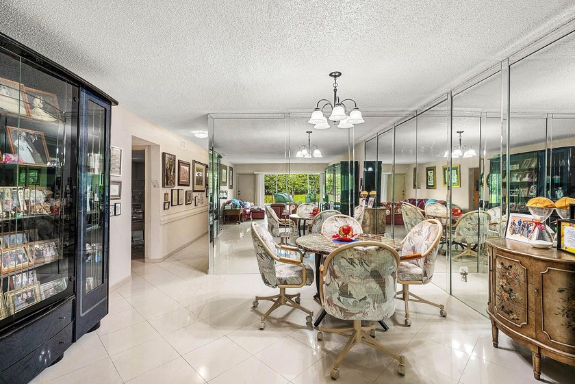 Tucked away as a private end-unit in desirable Town Villas, this - photo 12