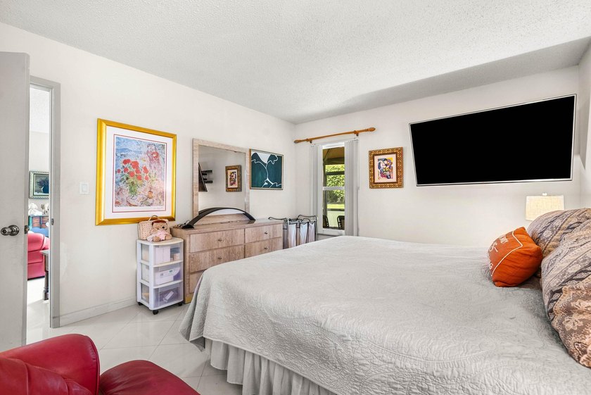 Tucked away as a private end-unit in desirable Town Villas, this - photo 20