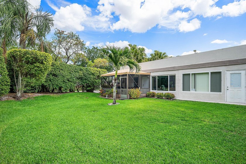 Tucked away as a private end-unit in desirable Town Villas, this - photo 28