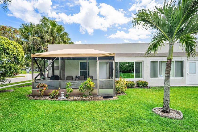 Tucked away as a private end-unit in desirable Town Villas, this - photo 29