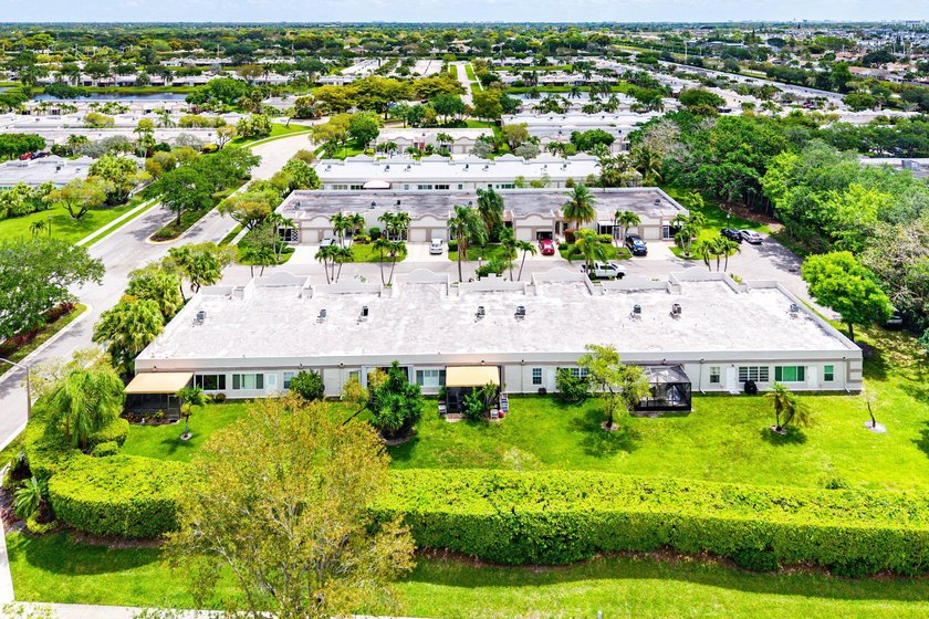 Tucked away as a private end-unit in desirable Town Villas, this - photo 39