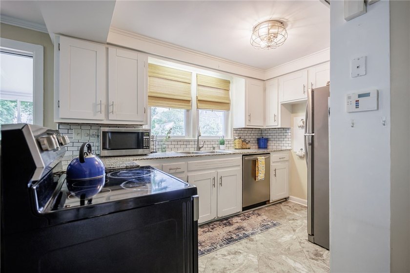 Welcome to this Amazing 3 bedroom colonial home situated in the - photo 5