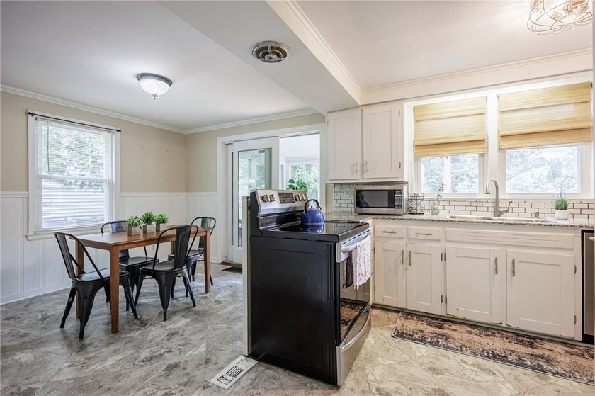 Welcome to this Amazing 3 bedroom colonial home situated in the - photo 7