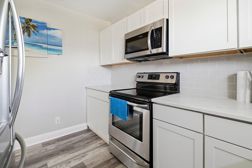 Welcome to 2000 Greens Blvd, Unit 40-C. This beautifully - photo 12