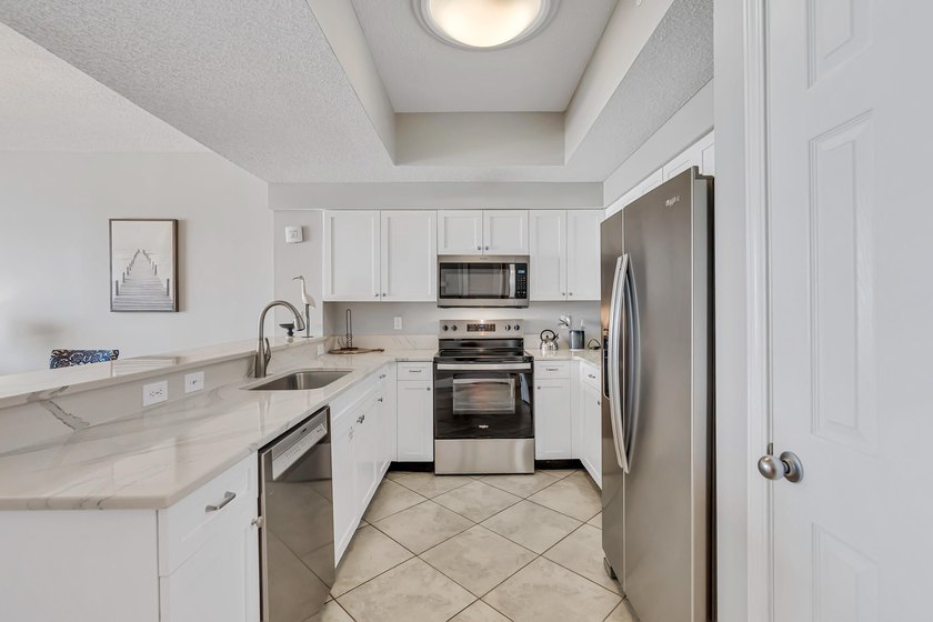 UPDATED CONDO located at Majestic Sun with direct garage access - photo 8