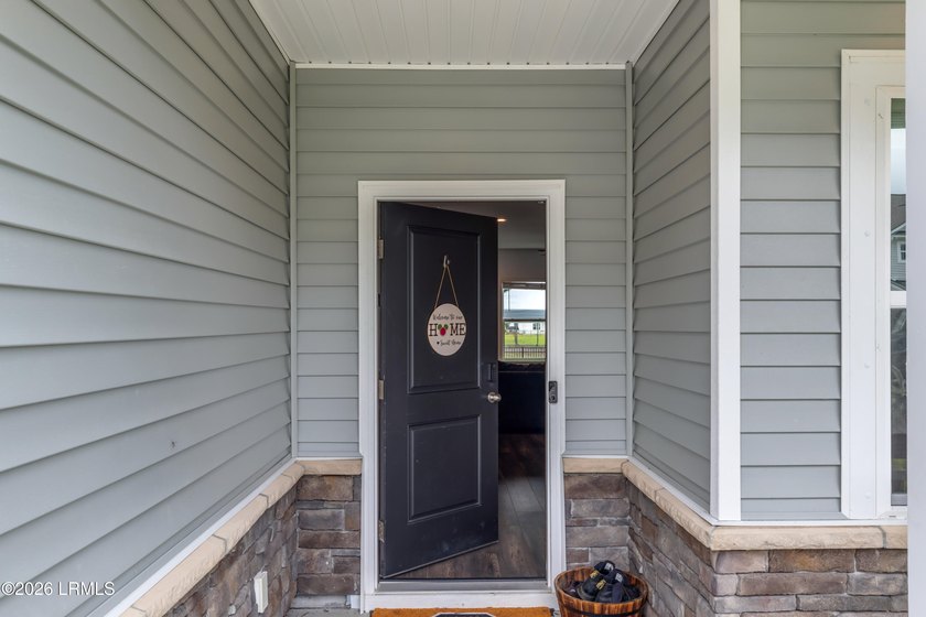 Welcome to this stunning Lowcountry gem in the highly - photo 3