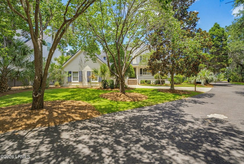 This exceptional Cat Island waterfront property captures the - photo 2