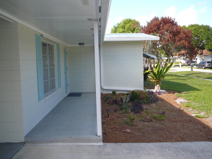 BEAUTIFUL 2/2 WITH CARPORT, CONCRETE BLOCK, NEW METAL ROOF AND - photo 12