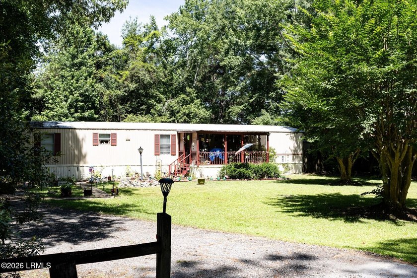 ATTENTION ALL CASH BUYERS! Welcome to this 3-bed, 2-bath 1991 - photo 4