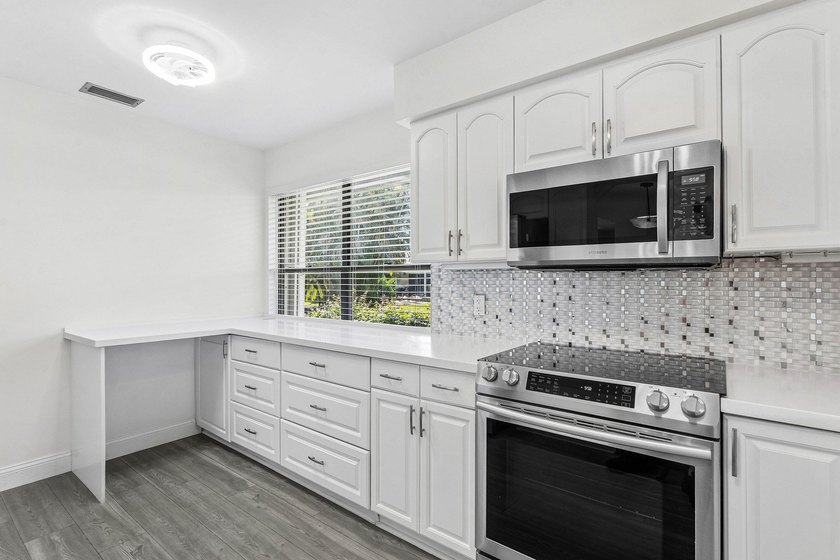 Experience the best of Eastpointe Country Club living in this - photo 16