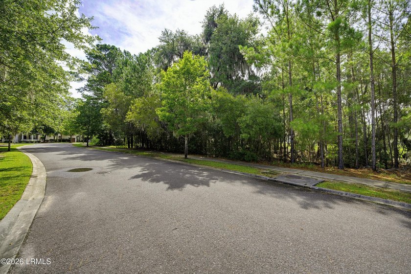Stunning waterfront homesite among the oaks with expansive views - photo 4