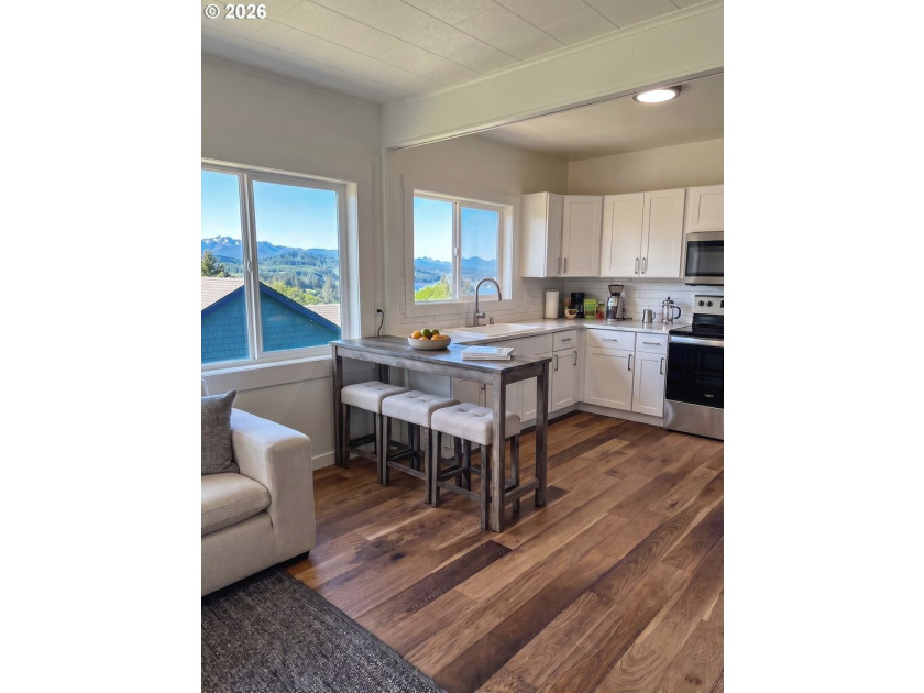 Perched above charming downtown Nehalem, this remodeled coastal - photo 3