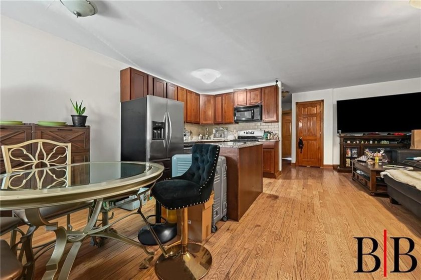 Beautifully redone 2 family house. Nothing to do but move in - photo 5