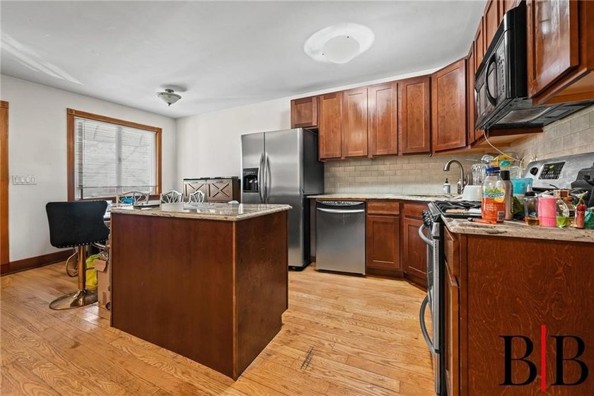Beautifully redone 2 family house. Nothing to do but move in - photo 7