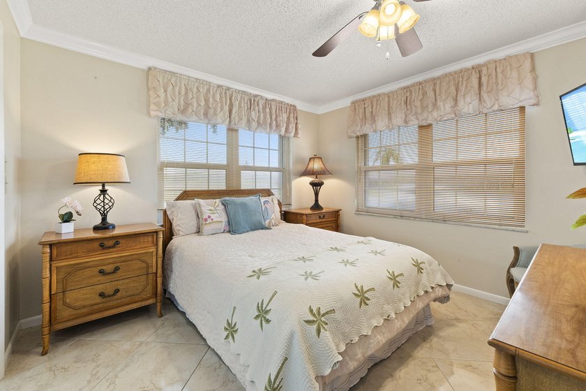 End-unit condo in 55+ community offering added privacy, abundant - photo 14