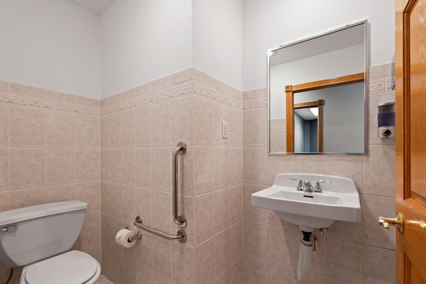 The main level offers 1,365 square feet, providing four offices - photo 16
