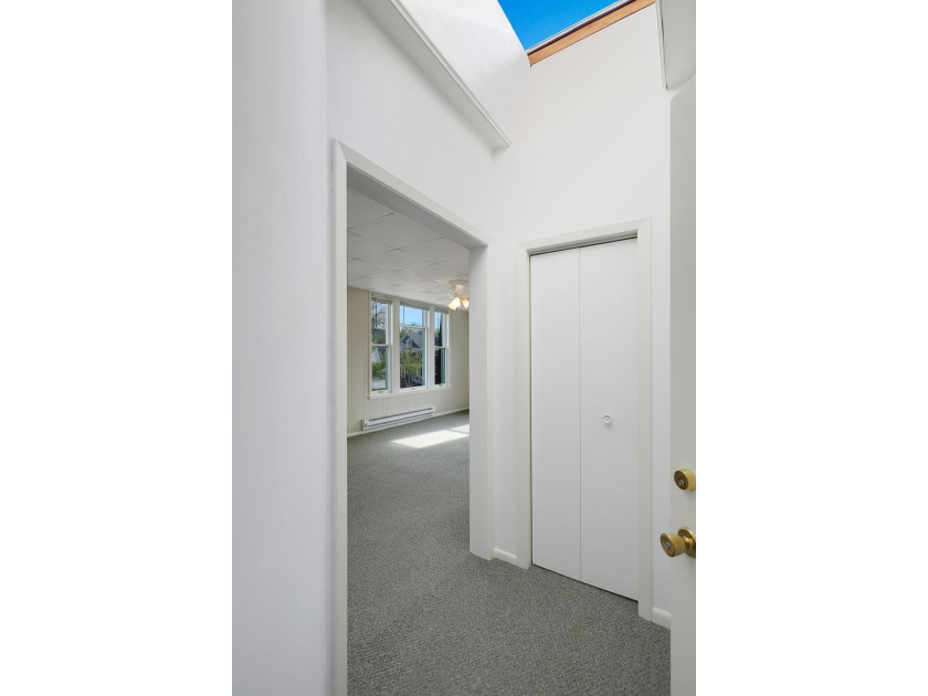 The main level offers 1,365 square feet, providing four offices - photo 18