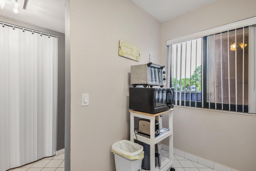 Well-maintained and furnished 1-bedroom condo featuring a - photo 11