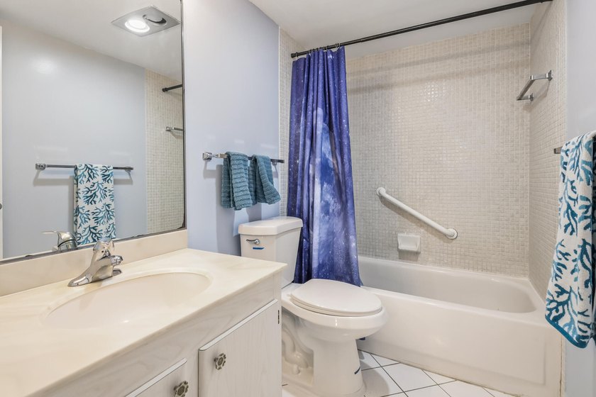 Well-maintained and furnished 1-bedroom condo featuring a - photo 14