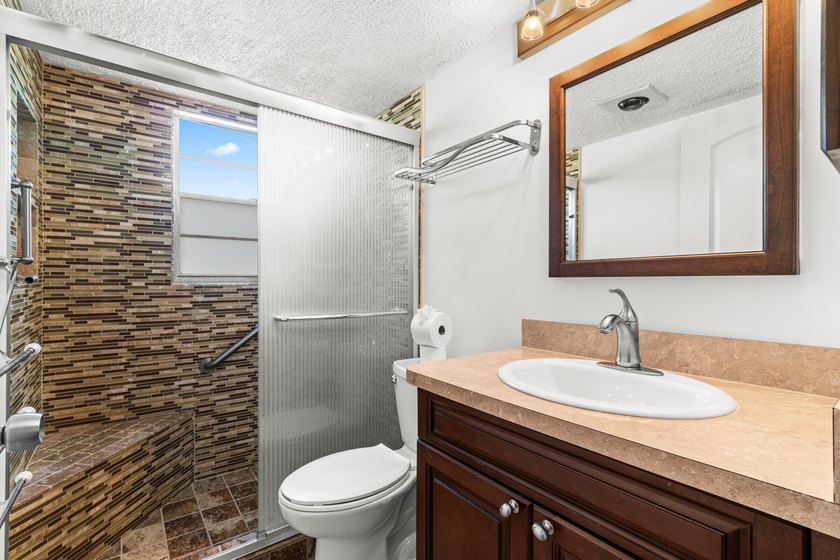 STEP INTO YOUR FIRST-FLOOR DREAM CONDO IN AN ACTIVE 55 + - photo 17