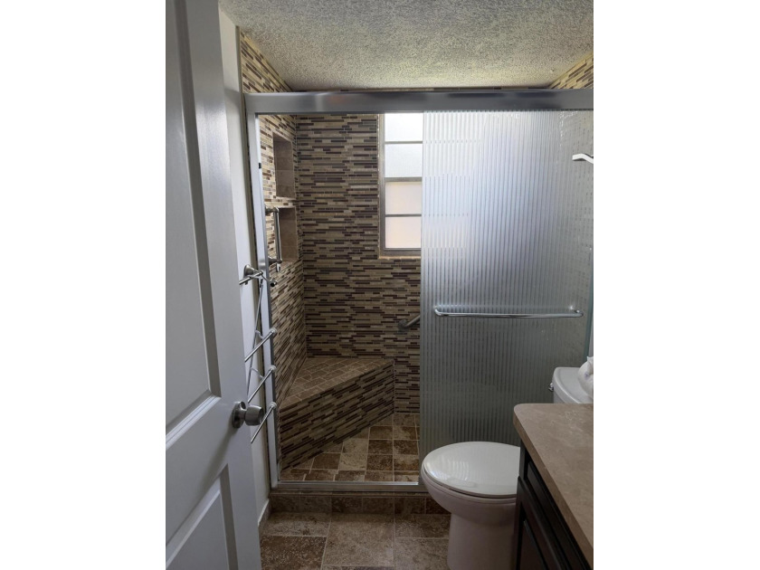 STEP INTO YOUR FIRST-FLOOR DREAM CONDO IN AN ACTIVE 55 + - photo 26