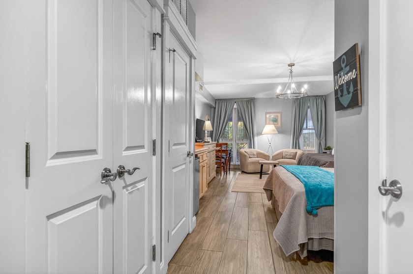 This fully furnished second floor condo located in the Grand - photo 9