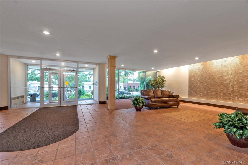 Experience modern comfort in this oversized one-bedroom COOP - photo 2