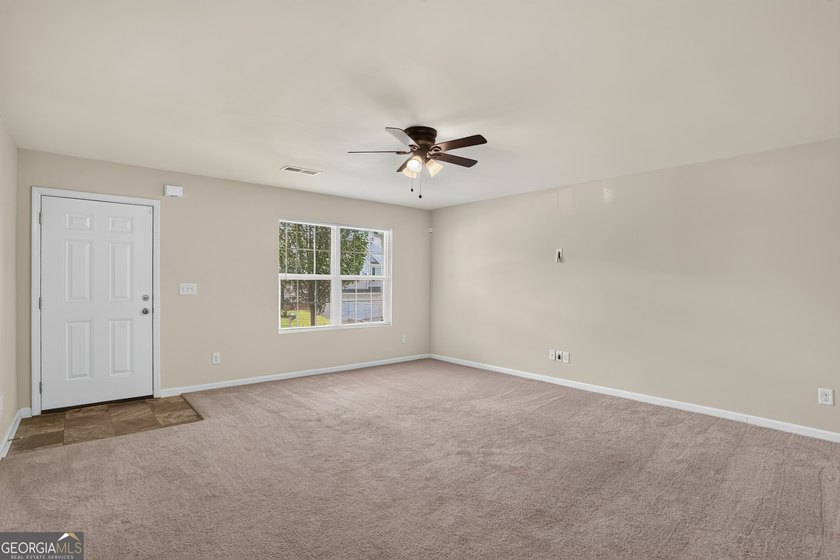 This charming 4-bedroom, 2.5-bath residence offers the ideal - photo 4