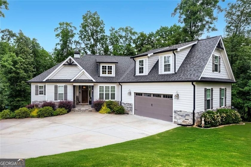 Welcome home to 115 Rowboat Drive, a gorgeous craftsman tucked - photo 3