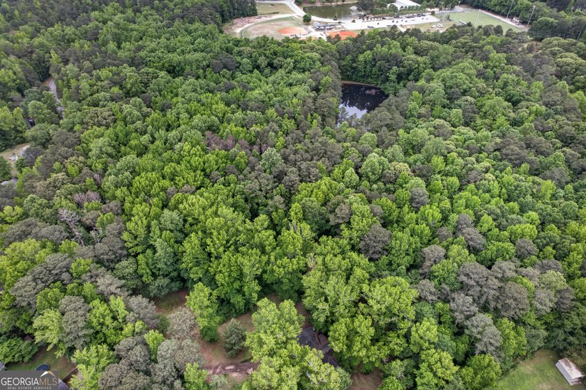 Discover a rare opportunity to own nearly 20 acres of beautiful - photo 3