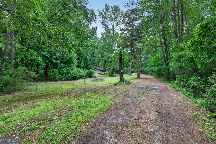 Discover a rare opportunity to own nearly 20 acres of beautiful - photo 6