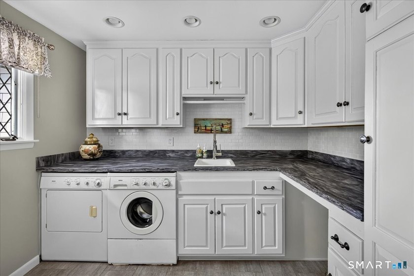 Two distinct homes. One extraordinary address. Both equal in - photo 16