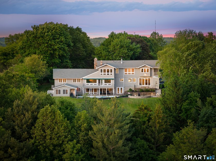 Two distinct homes. One extraordinary address. Both equal in - photo 21
