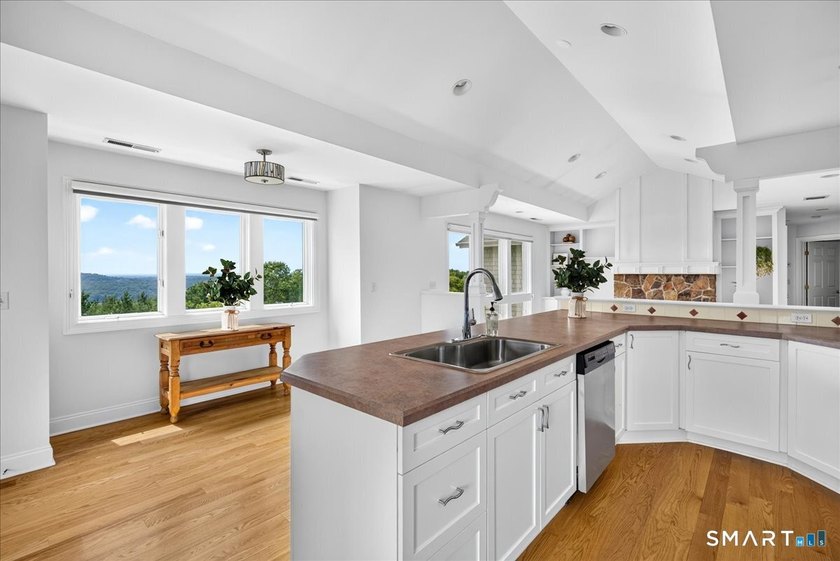 Two distinct homes. One extraordinary address. Both equal in - photo 32