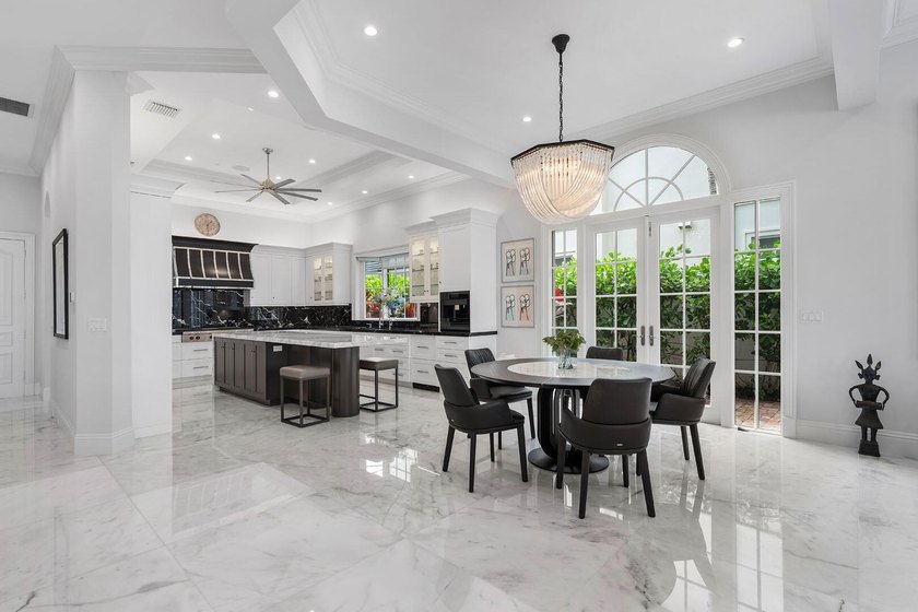 Nestled along the widest canal in Royal Palm Yacht &amp; Country - photo 12