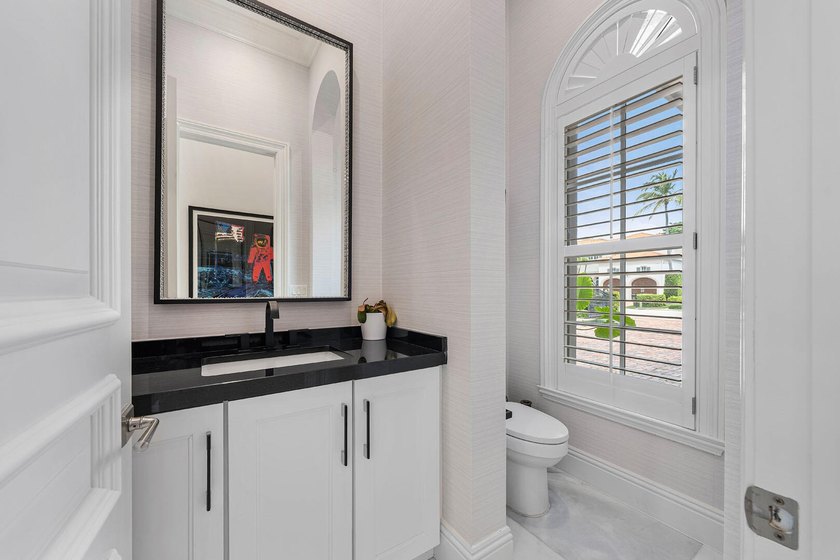 Nestled along the widest canal in Royal Palm Yacht &amp; Country - photo 32