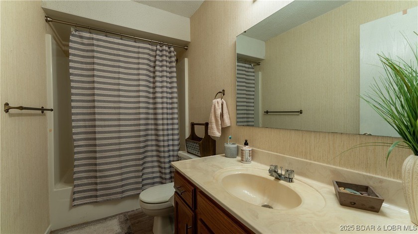Discover lakeside living at its finest with this cozy 2-bed - photo 13