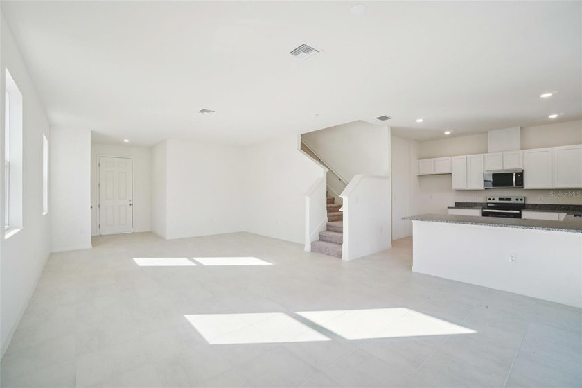 This picturesque, two-story home showcases an open floor plan - photo 3